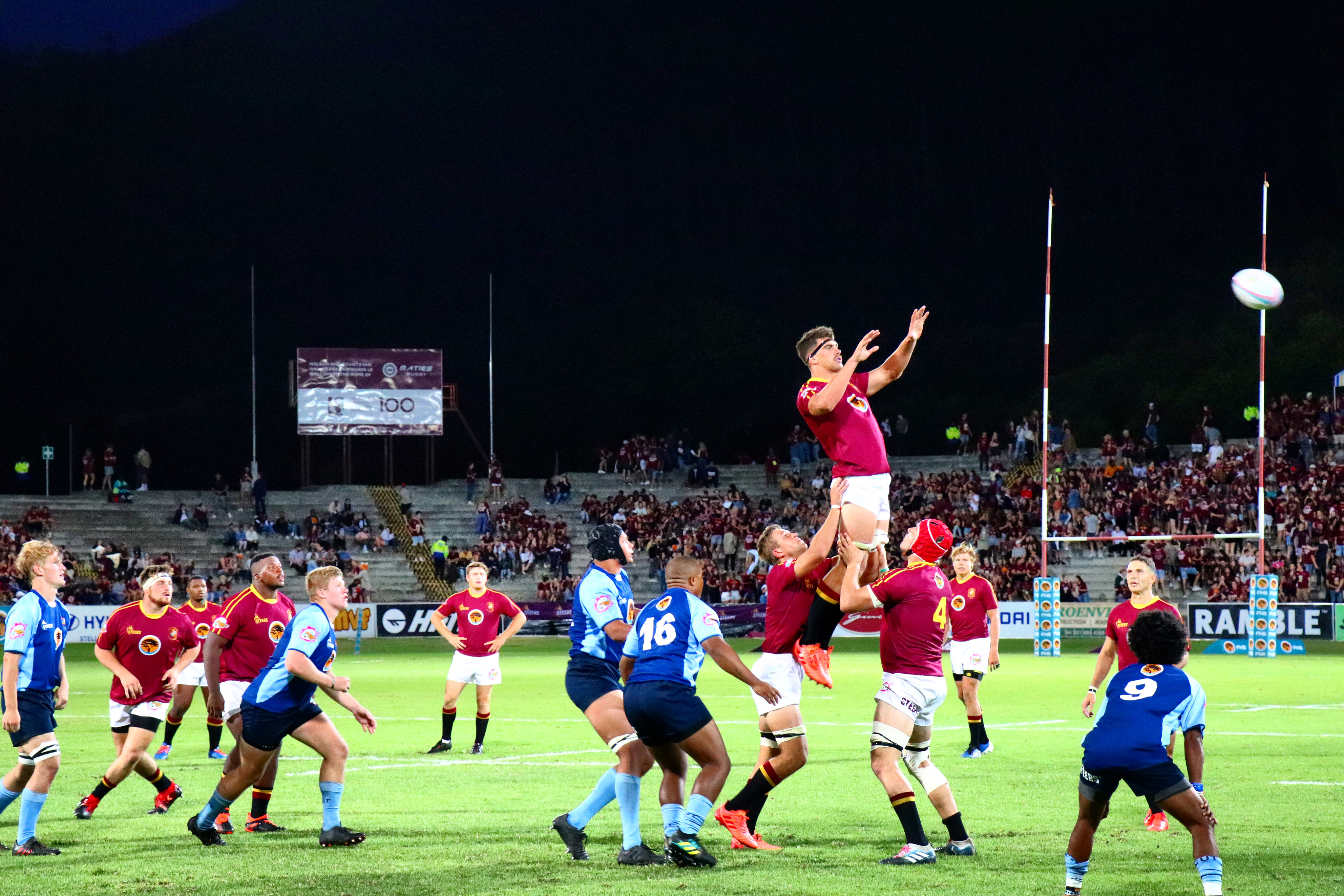 Men in Maroon March On